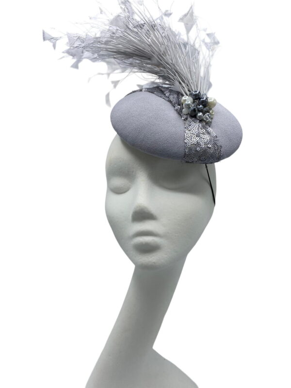 Stunning grey/silver/pewter headpiece with a beautiful spray of feathers to the back. 
